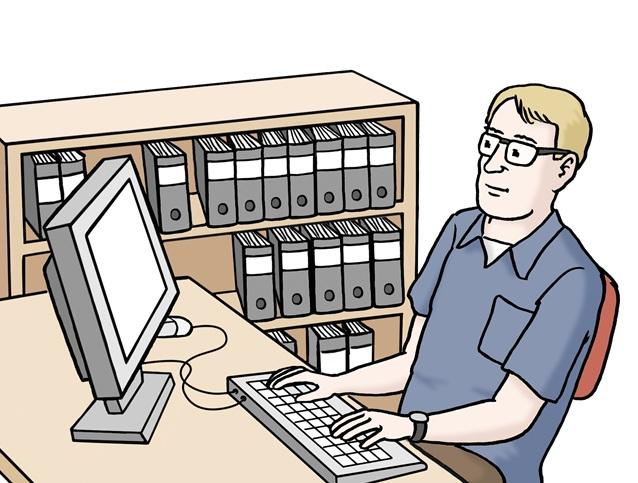 Mann am Schreibtisch im Büro