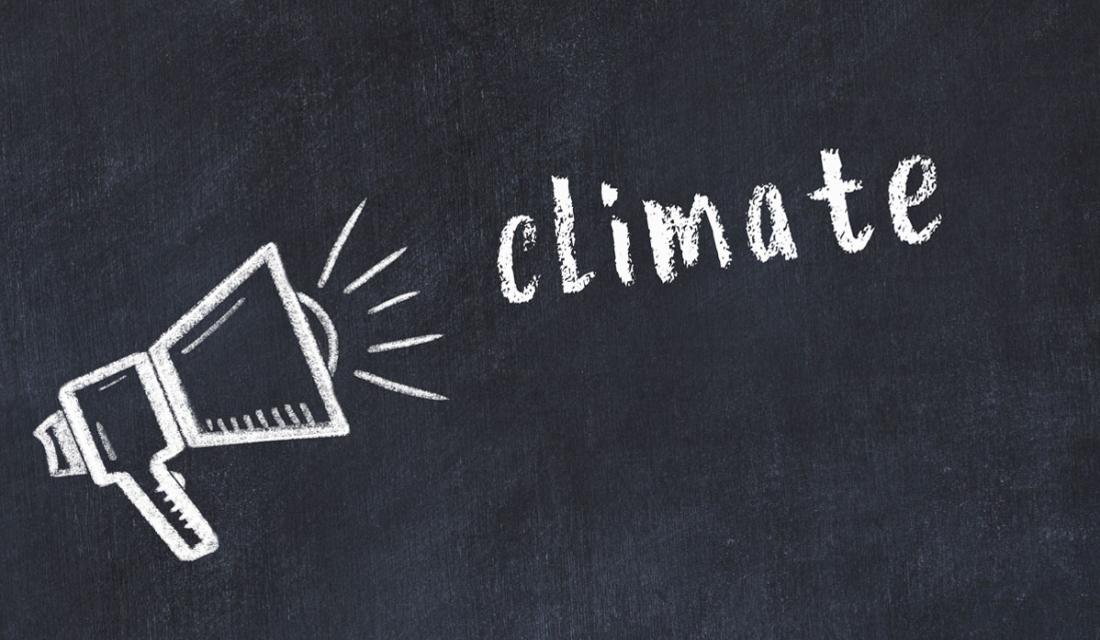 Ein Megaphon mit dem Ausruf Klimapolitik